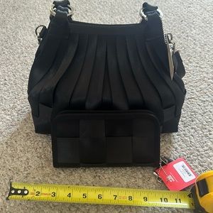 Brand new Harvey’s purse and matching wallet. Brand new; never used, with tags.